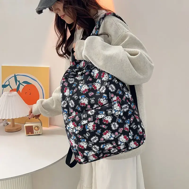Sanrio hello kitty Student Schoolbag Large Capacity Backpack Y2K Graffiti Boys and Girls Travel Bag Handbag shoulder bag