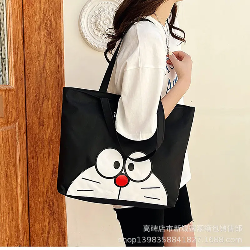 cartoon fashion High capacity men  handbag Doraemon canvas shoulder bag girl women cute Travel shopping storage bag