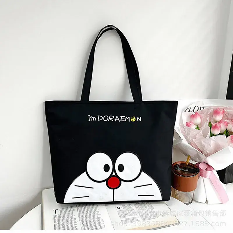 cartoon fashion High capacity men  handbag Doraemon canvas shoulder bag girl women cute Travel shopping storage bag