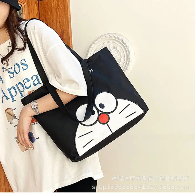 cartoon fashion High capacity men  handbag Doraemon canvas shoulder bag girl women cute Travel shopping storage bag