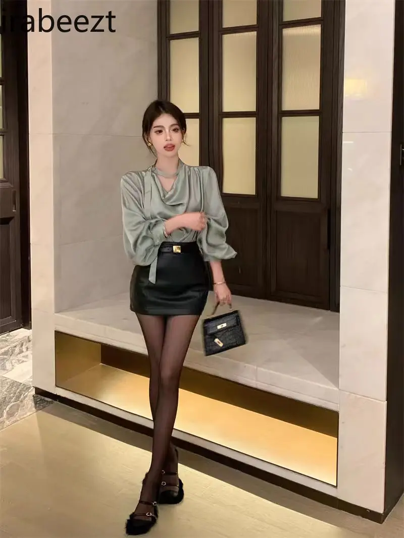 High-end Satin Long-sleeved Shirt Female 2025 Spring and Summer Style Hip-wrapped Half-length Leather Skirt Two-piece Suit