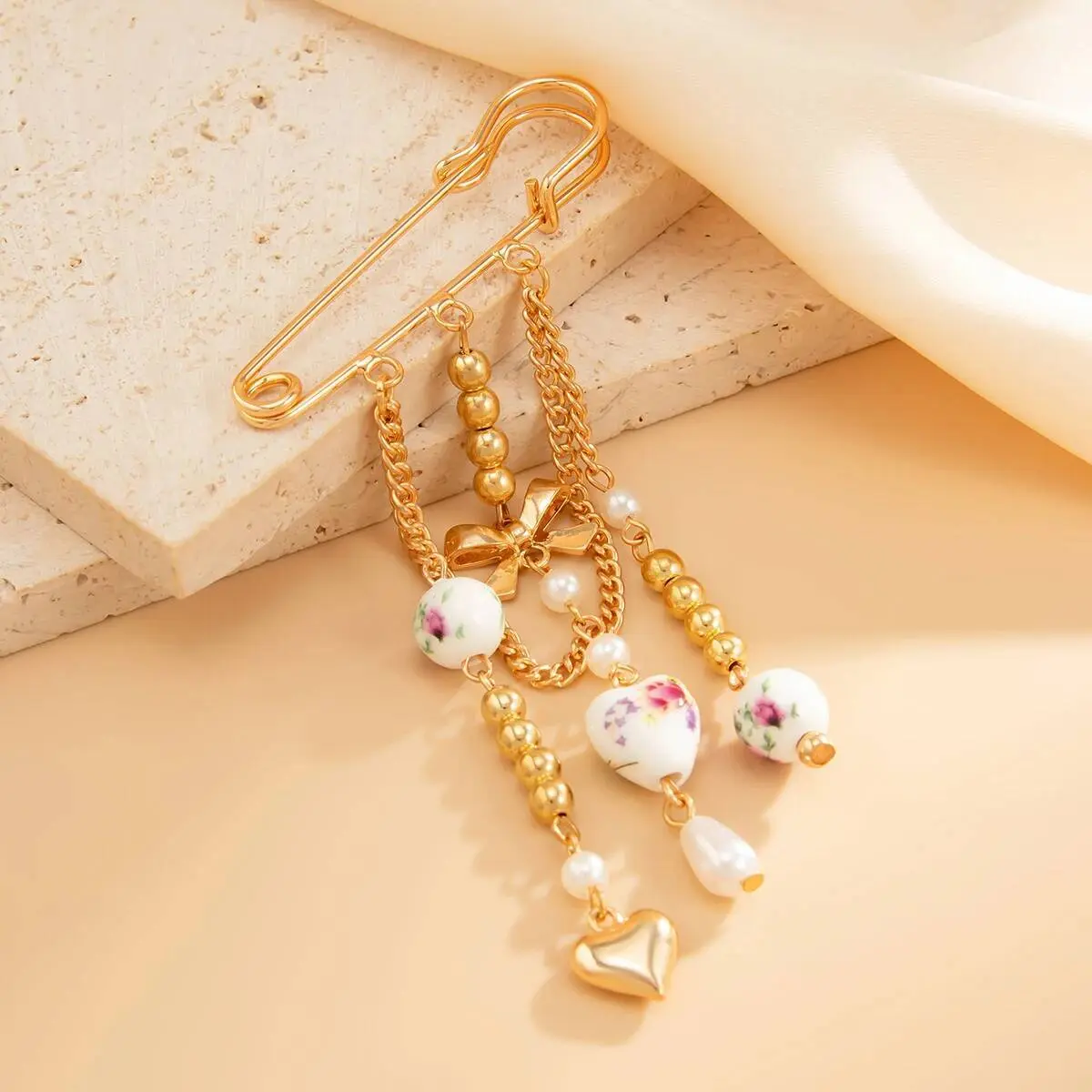Ingemark Elegant Ceramic Love Heart Beads Bowknot Tassel Brooch for Women Fashion Dress Suit Collar Pins Clip Party Jewelry Gift