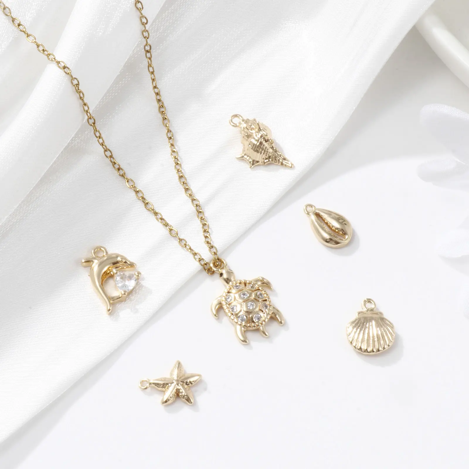 1 Set ( 6 PCs/Set) Brass Ocean Jewelry Charms 18K Gold Plated Shell Mixed 3D Dolphin Shell Conch Starfish Turtle Pendants DIY