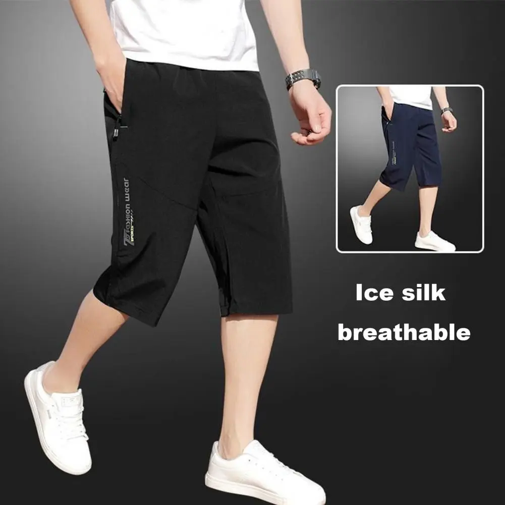 Men Cropped Pants Elastic Waist Loose Ice Silk Casual Pants Zipper Pockets Solid Color Mid Waist Men Mid-calf Length Trousers