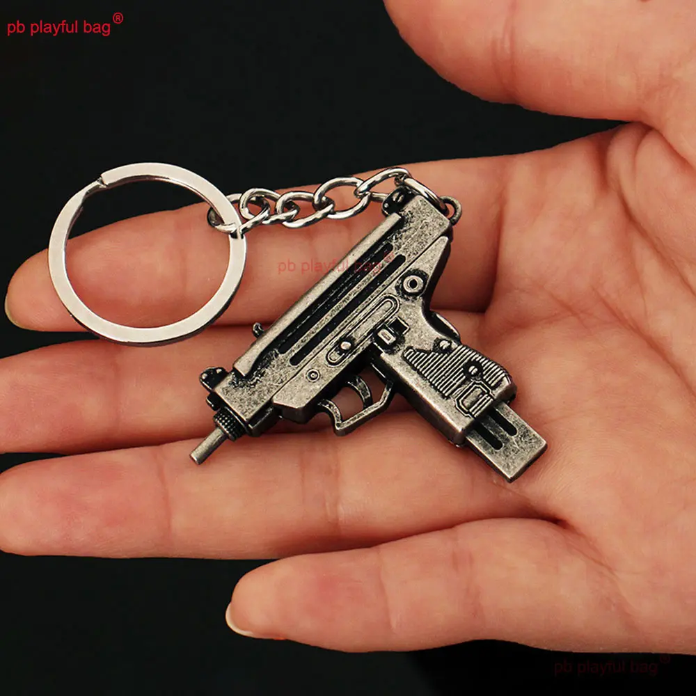 5cm Mini UZI Toy Gun Model Pendant Keychain Removable Metal Key Ring Decoration Crafts Game Action Figure Kids Gifts ZG397