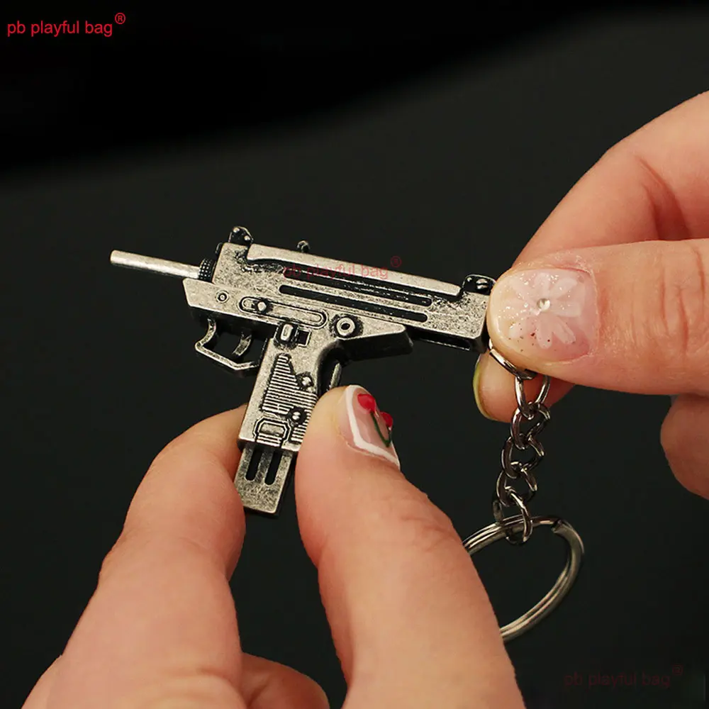 5cm Mini UZI Toy Gun Model Pendant Keychain Removable Metal Key Ring Decoration Crafts Game Action Figure Kids Gifts ZG397