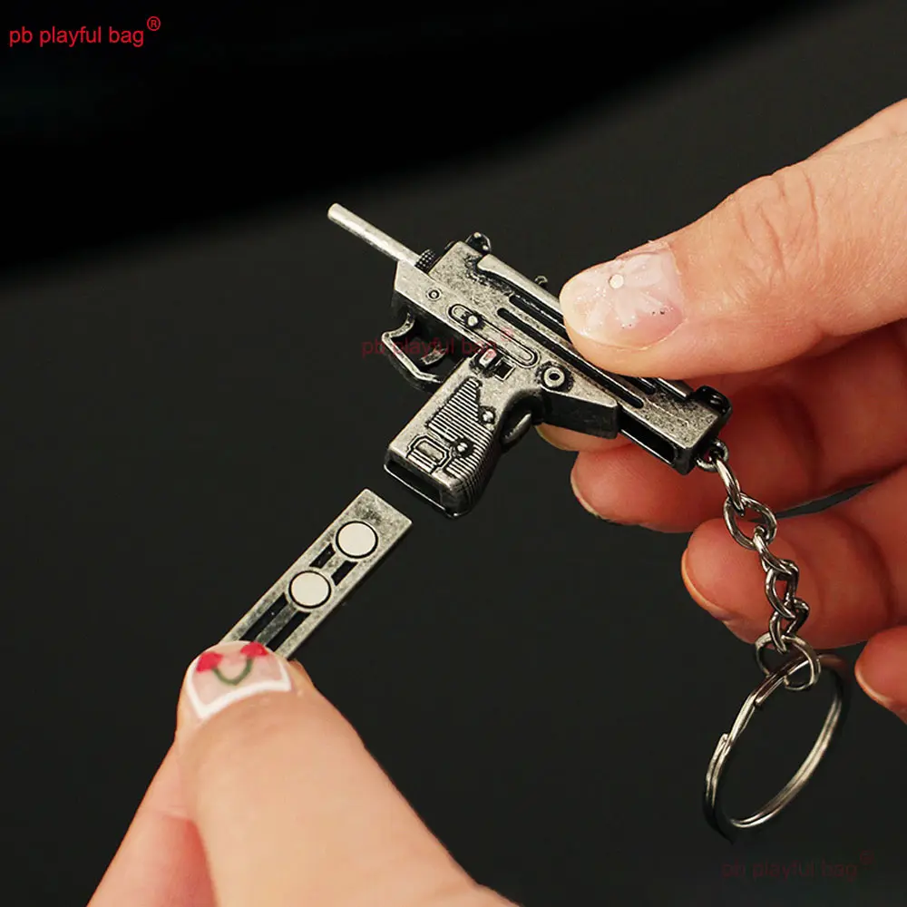 5cm Mini UZI Toy Gun Model Pendant Keychain Removable Metal Key Ring Decoration Crafts Game Action Figure Kids Gifts ZG397