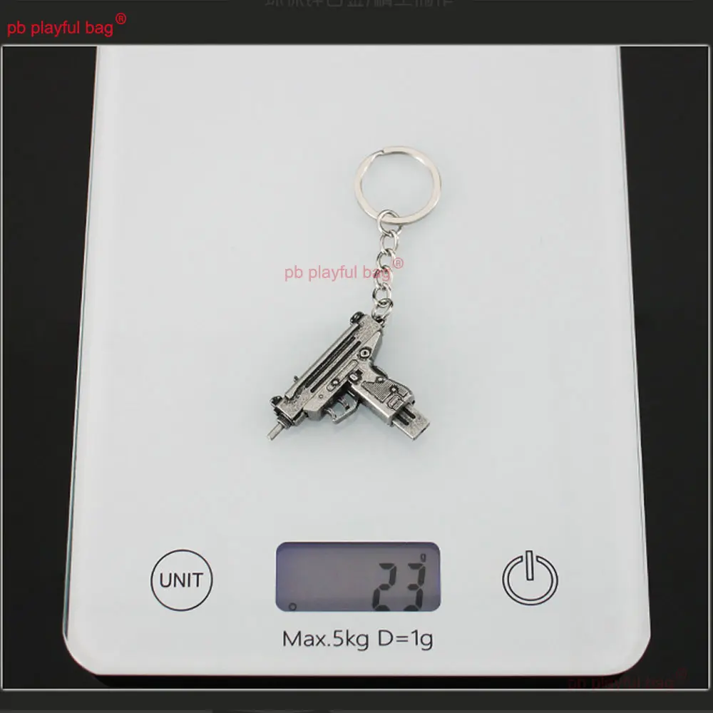 5cm Mini UZI Toy Gun Model Pendant Keychain Removable Metal Key Ring Decoration Crafts Game Action Figure Kids Gifts ZG397