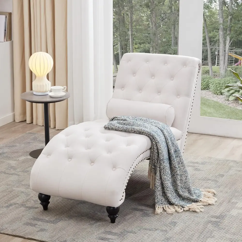 "indoor upholstered button tufted chaise lounge with solid wood legs and support pillow for bedroom and living room"