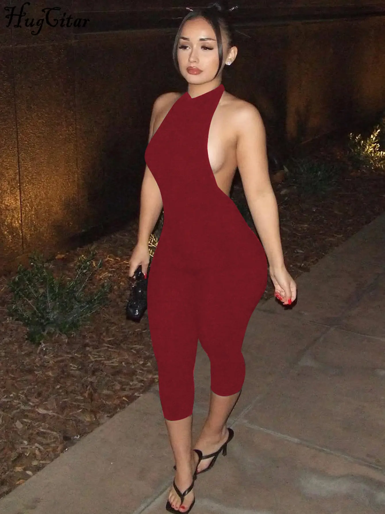 Hugcitar Ribbed Halter Backless Solid Button Sexy Bodycon Skinny Jumpsuit Summer Women Fashion Vacation Romper Streetwear Club