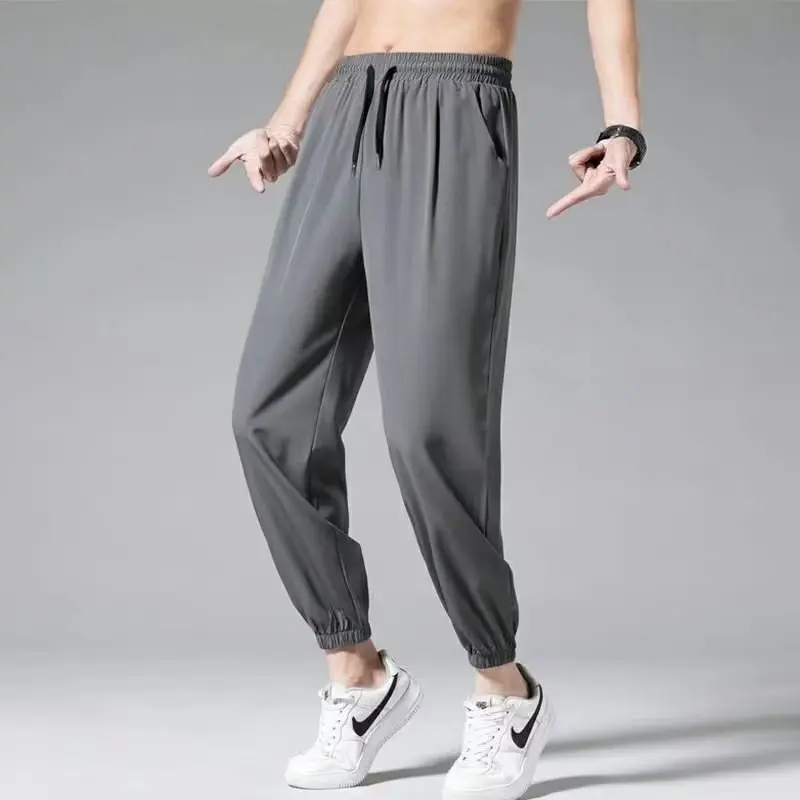 Men's Summer Thin Ice Silk Student Solid Color Straight Tube Loose Wide Leg Bundle Foot Casual Nine Point Pants Sports Men's Pan