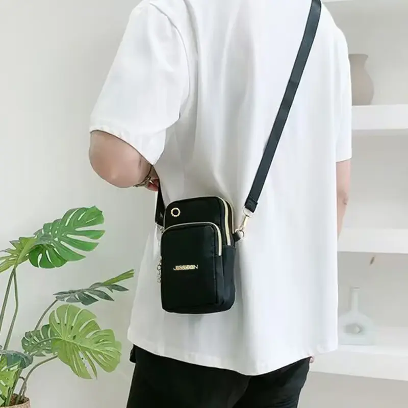Mobile phone bag Female crossbody mini bag Summer mobile phone cloth bag vertical neck portable wrist purse