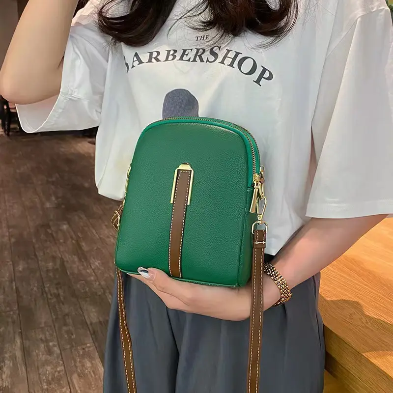 Crossbody bag women's new autumn and winter Japan and South Korea PU soft vertical solid color personality design with headphone