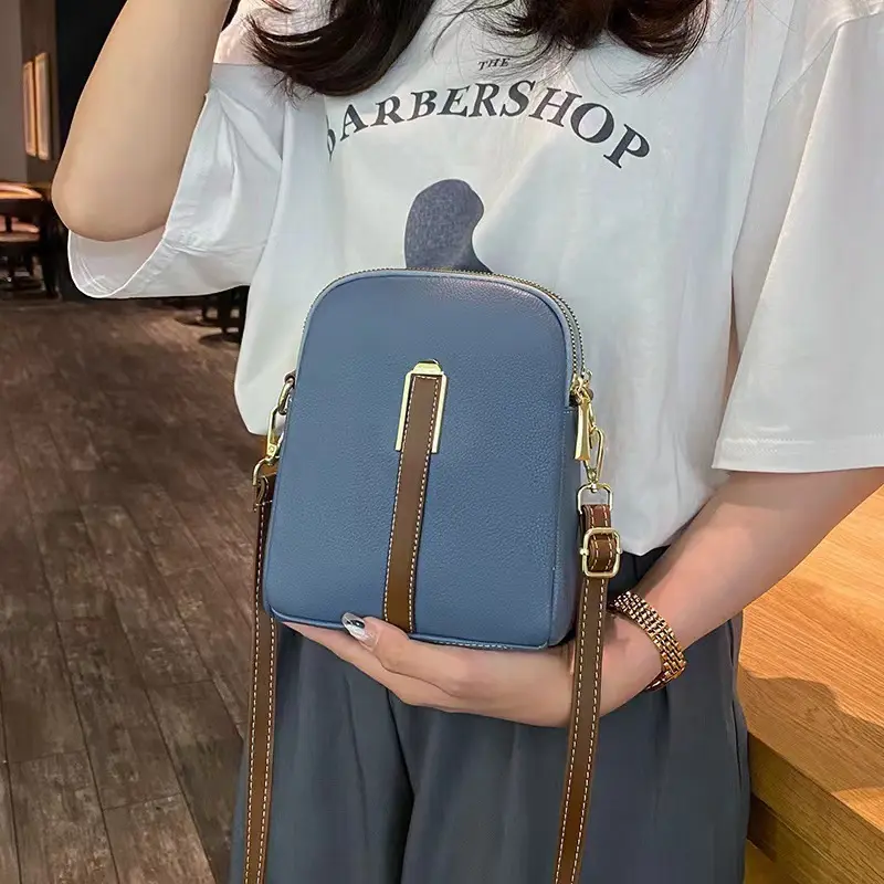Crossbody bag women's new autumn and winter Japan and South Korea PU soft vertical solid color personality design with headphone