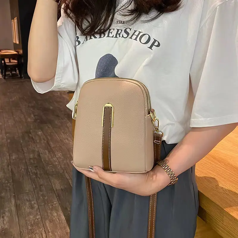 Crossbody bag women's new autumn and winter Japan and South Korea PU soft vertical solid color personality design with headphone