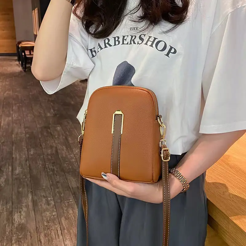 Crossbody bag women's new autumn and winter Japan and South Korea PU soft vertical solid color personality design with headphone