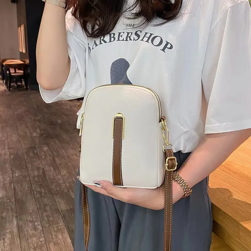 Crossbody bag women's new autumn and winter Japan and South Korea PU soft vertical solid color personality design with headphone