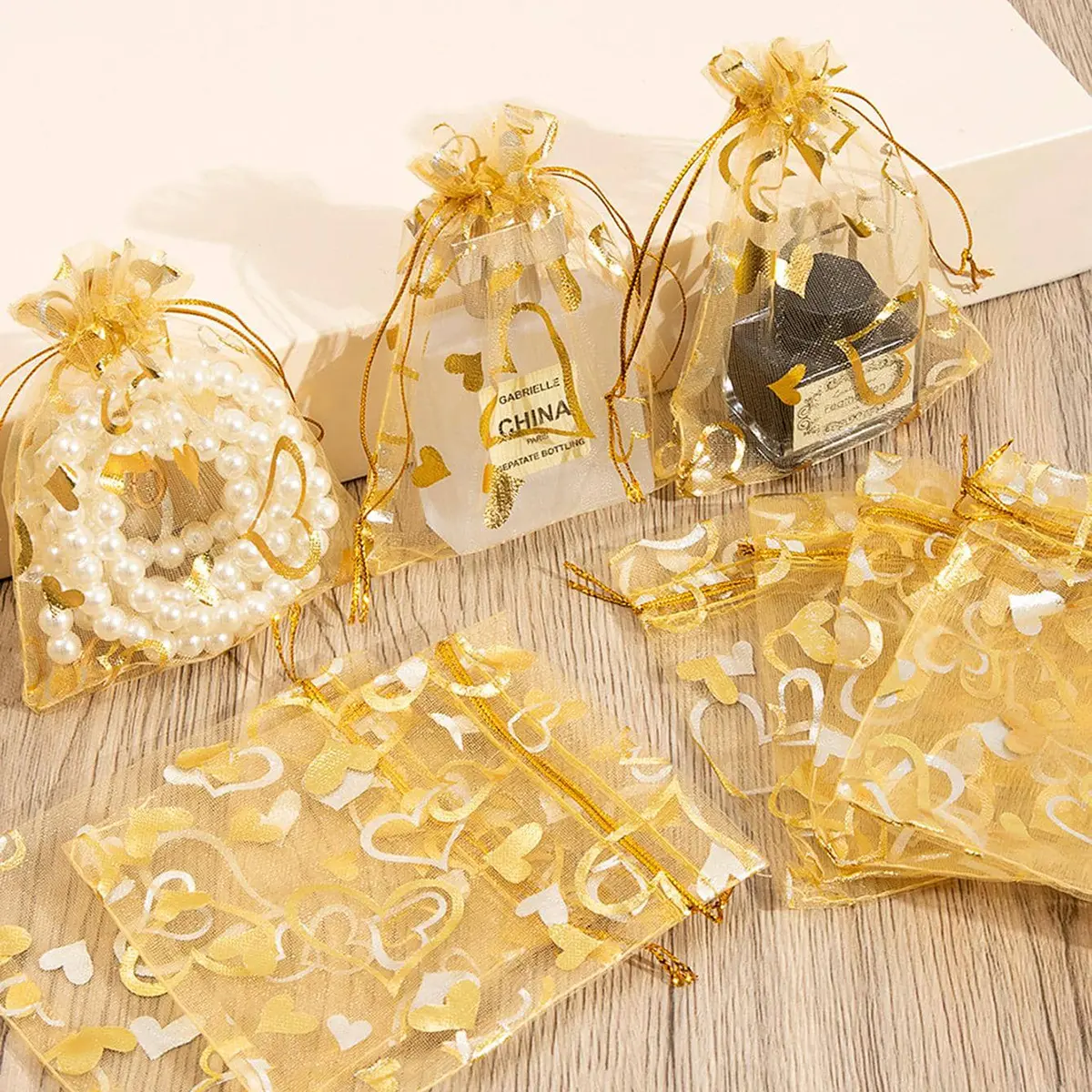 ​20/50pcs/lot Drawstring Organza Gift Bag Hot Gold Color heart Print Pouches Wedding Christmas Party Candy Jewelry Packing