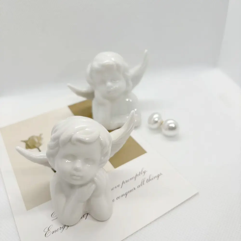 Modern Angel Fairy Figurines Fun Crafts Atmosphere Angel Statues Sculpture Pure white Ceramic Angel Ornamen Living Room Desktop