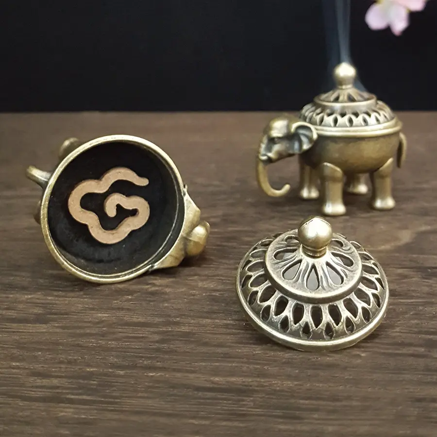 1pc Exquisite and compact hollow out elephant four legged incense burner indoor stove board desktop home decoration
