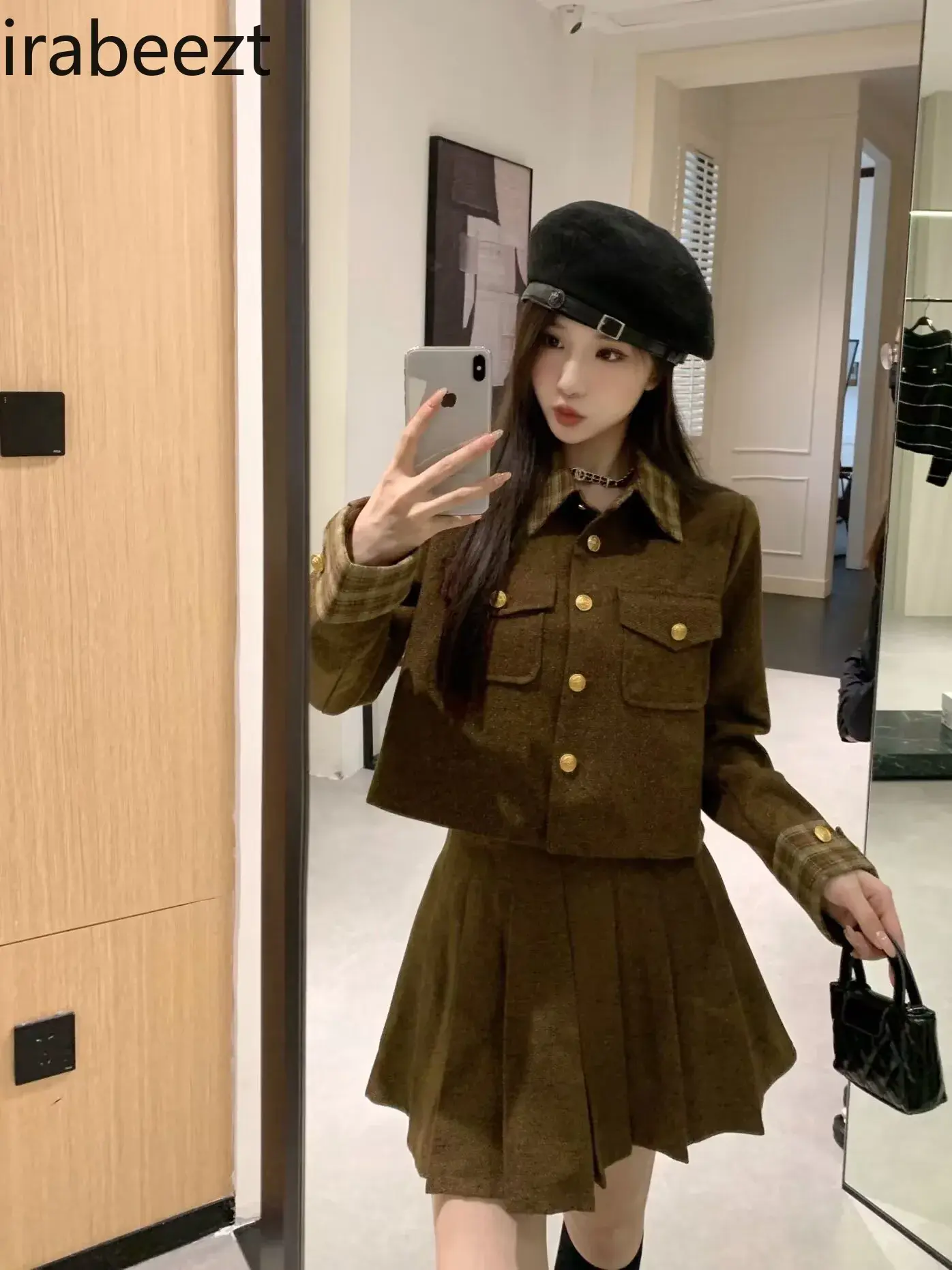 women's autumn and winter high-grade spliced striped POLO collar short coat shows a thin pleated skirt ensembles de jupes