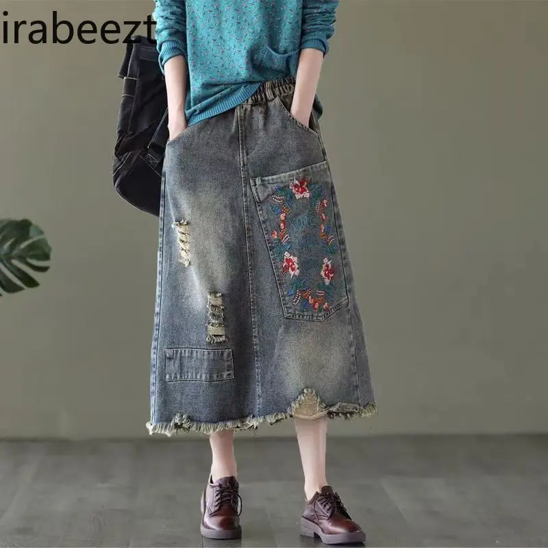 Women's Spring Vintage Embroidered Denim Skirt with Large Pockets Distressed Hem Tie Waist A-Line Midi Skirt Casual High Waist