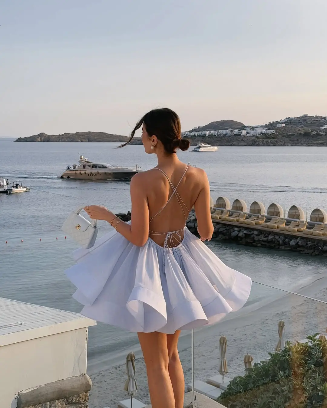Elegant Women's Summer Dress Made of Soft Cotton Fabric Featuring a Flowy Skirt and Spaghetti Straps Perfect for Beach Vacations