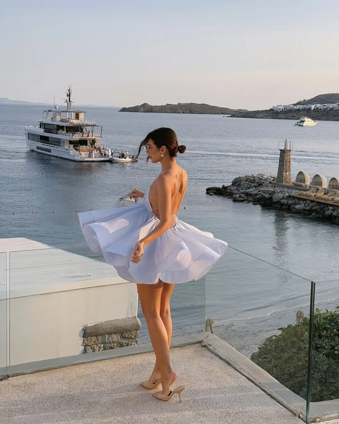 Elegant Women's Summer Dress Made of Soft Cotton Fabric Featuring a Flowy Skirt and Spaghetti Straps Perfect for Beach Vacations