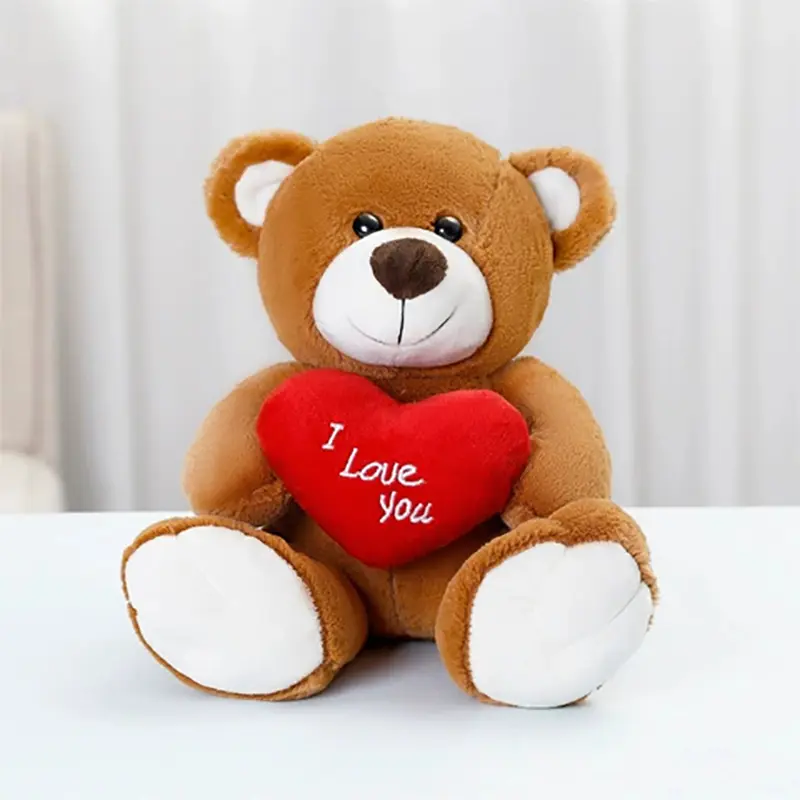 A lovely teddy bear holding a heart, a teddy bear doll, a cute heart-holding bear, suitable as a Valentine's Day gift.