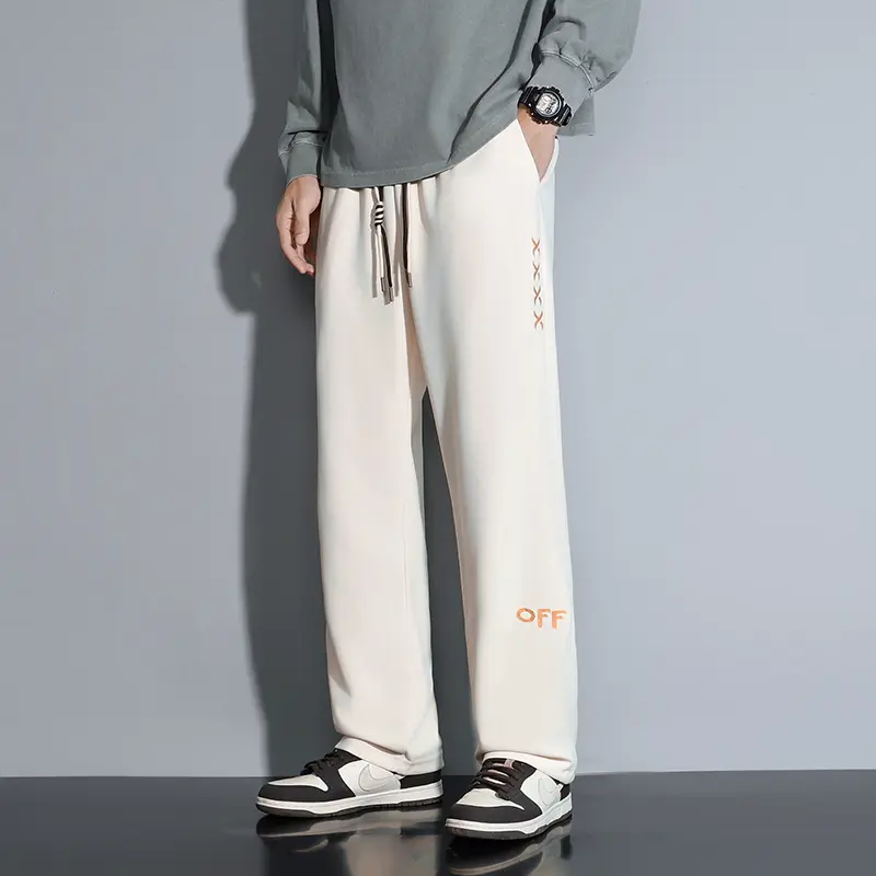 Contemporary Men's Fashion Trousers Loose Silhouette Trendy Drawstring Detail Suited for a Variety of Occasions Comfort
