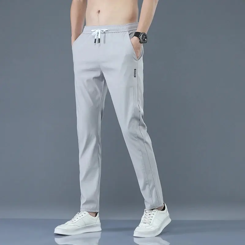 Men's New Casual Pants Fashion Stretch Straight Slim Pants Hong Kong Wind Ice Silk Loose Everything Trend Foreign Jogging Pants