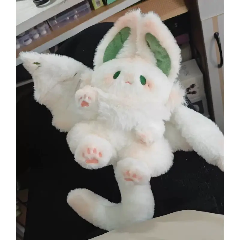 Cotton doll, smiling bat, big white rabbit plush toy, giving a birthday gift to a friend