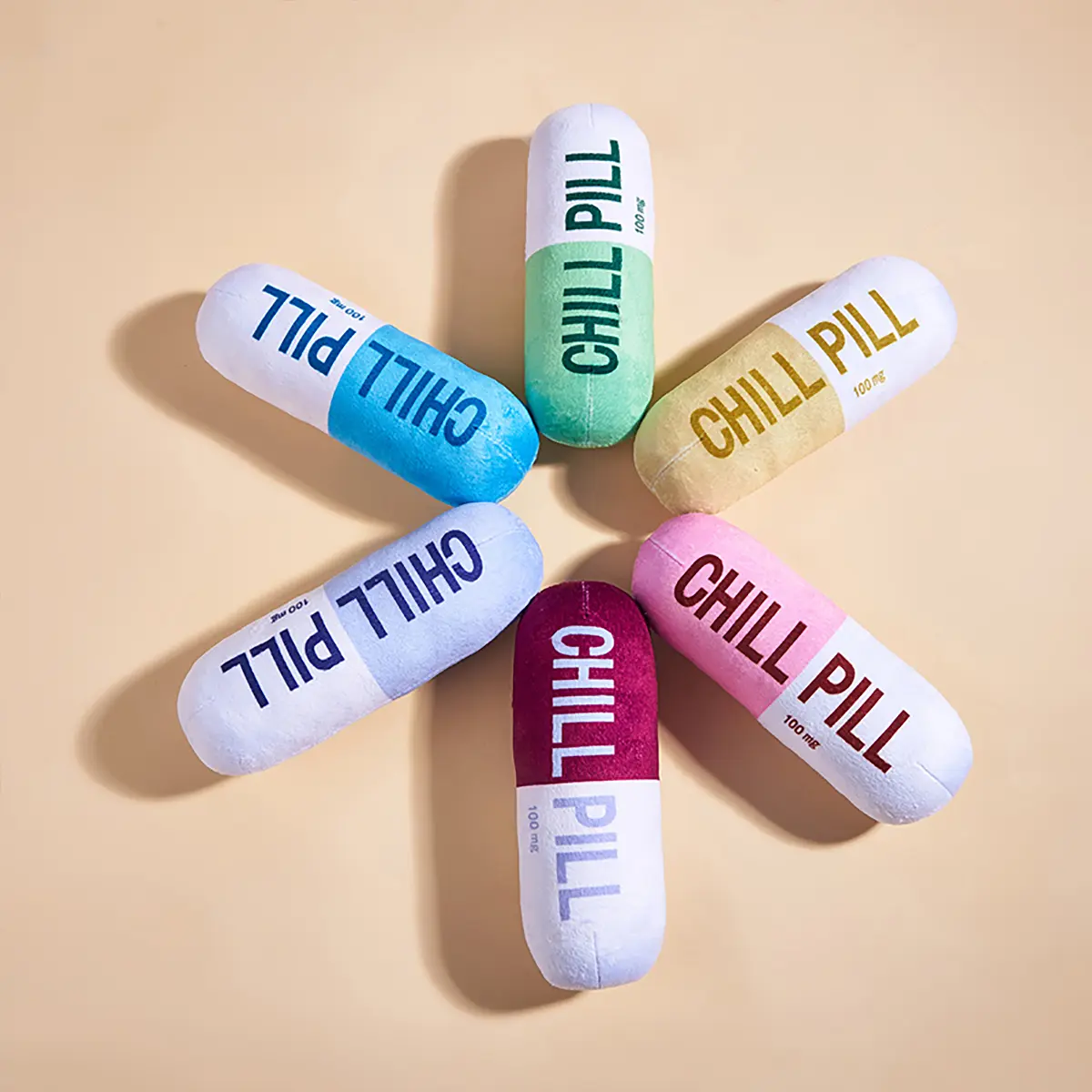 Interactive Plush Pill-Shaped Dog Toy with Squeaker - Durable, Bite-Resistant Chew Toy for Pet Play and Dental Health