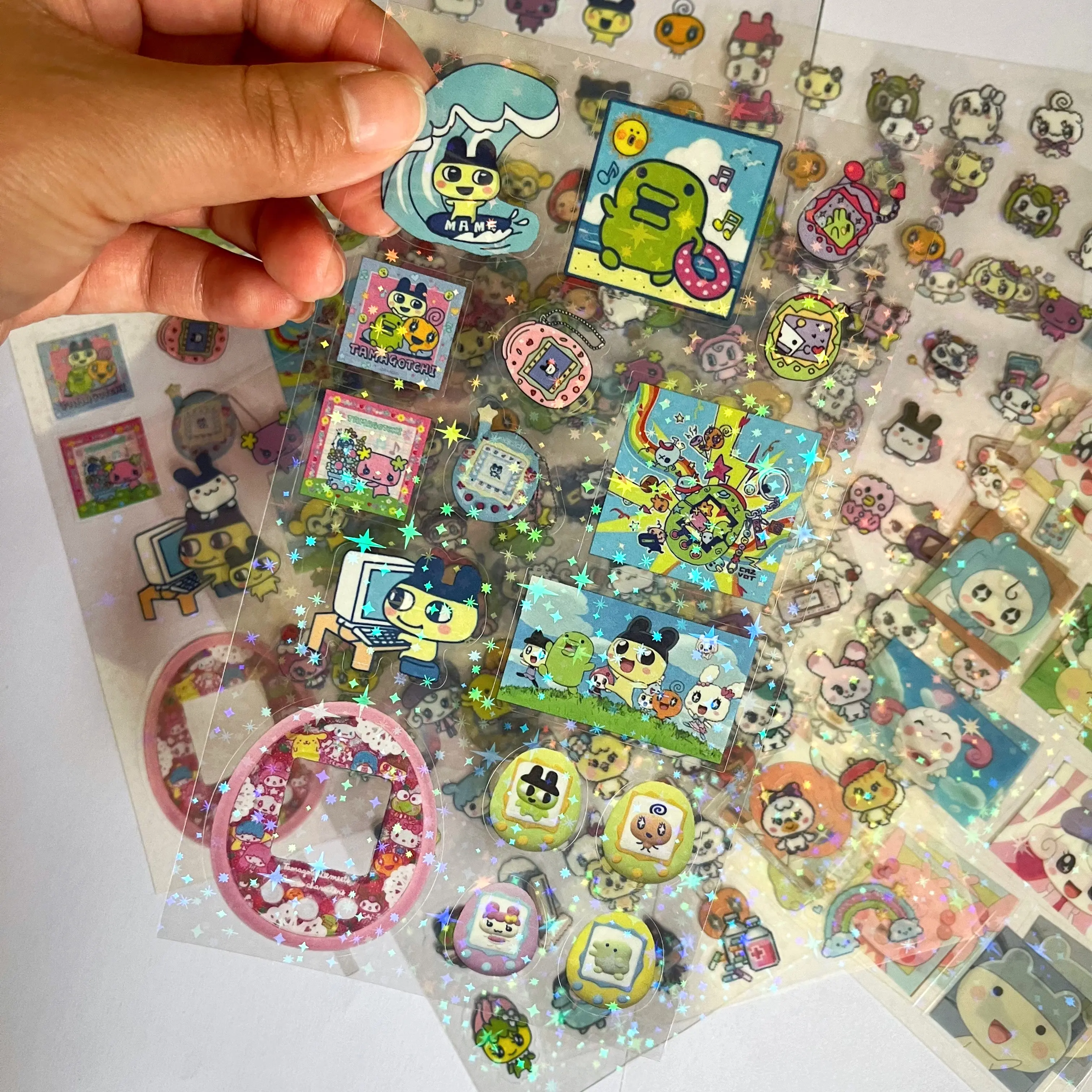 10Pcs Tamagotchi Mametchi Lovelitchi Transparent Laser Sparkling Stickers Girl Diary Handbook Decorative Source Material Sticker