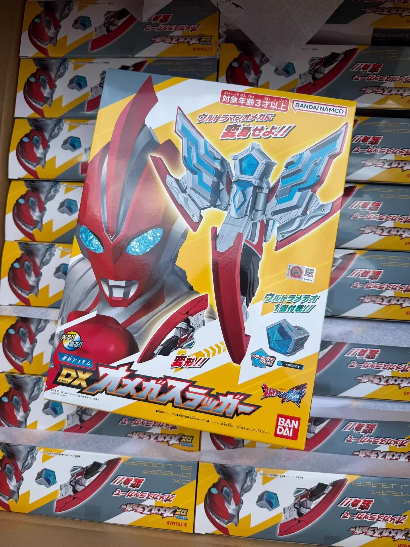 In Stock BANDAI Ultraman Omega Slugger DX Model Toy Collection With Acousto-optic Altman Summoner Omega Meteo MINI 