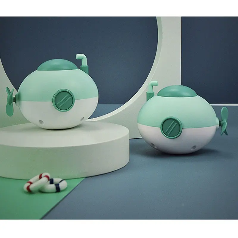 Baby takes a bath and plays in the water, Submarine, winding up animal chain, playing in the bathroom, children's toys