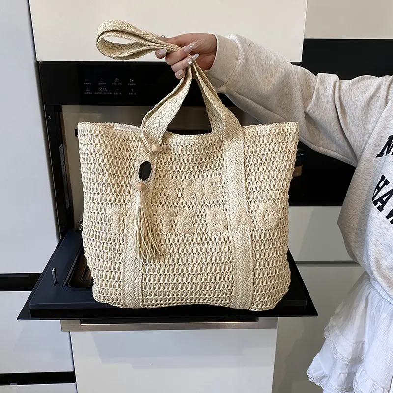 Straw woven bag, women's new versatile large capacity commuting tote bag, fashionable and stylish vacation bag