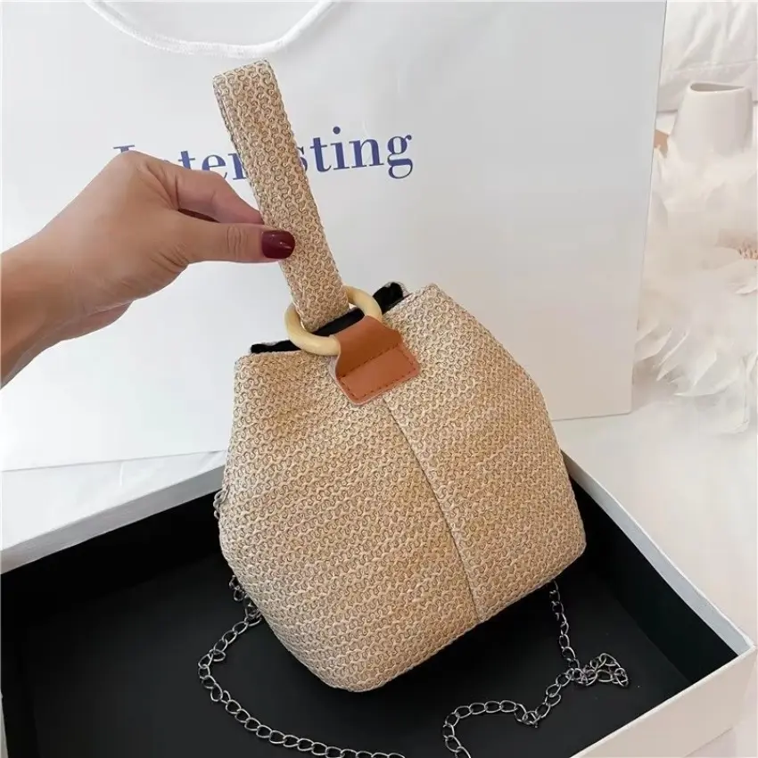 NEW 1 Pcs Women's Handheld One Shoulder Diagonal Straddle Bag Summer New Fashion Versatile PP Woven Chain Bucket Bag