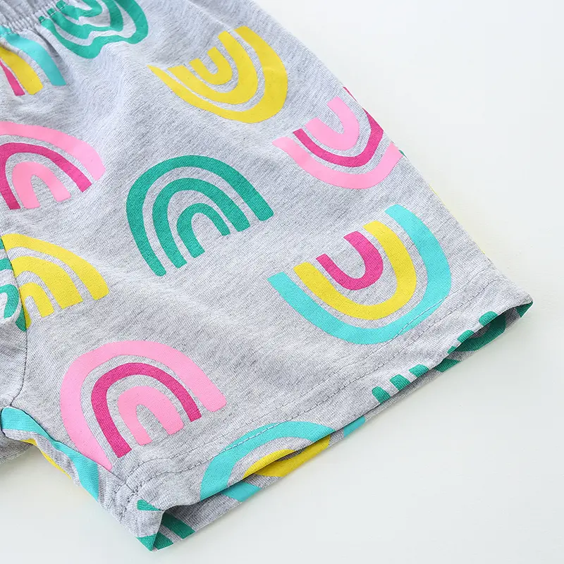 2Pcs Sunny Yellow Short Sleeve Kids' T shirt with Dinosaur & Rainbow Print, Paired with Gray Shorts featuring Rainbow Patterns
