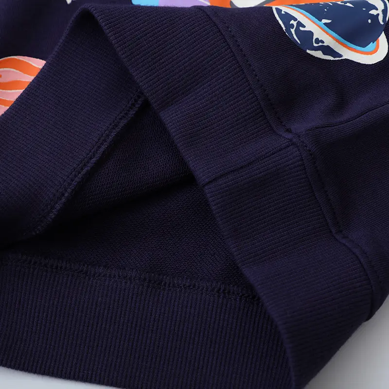 Eye Catching Navy Blue Long Sleeve Sweatshirt with Glow in the Dark Feature Unique Astronaut Surfing in Space Design