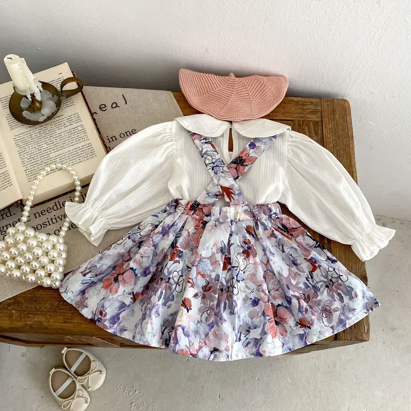 New autumn baby clothing, 0-3 year old baby girl's daisy embroidered sweater+ink wash floral strap skirt set