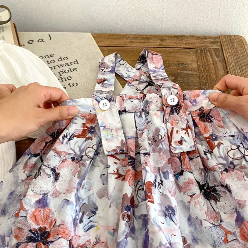 New autumn baby clothing, 0-3 year old baby girl's daisy embroidered sweater+ink wash floral strap skirt set