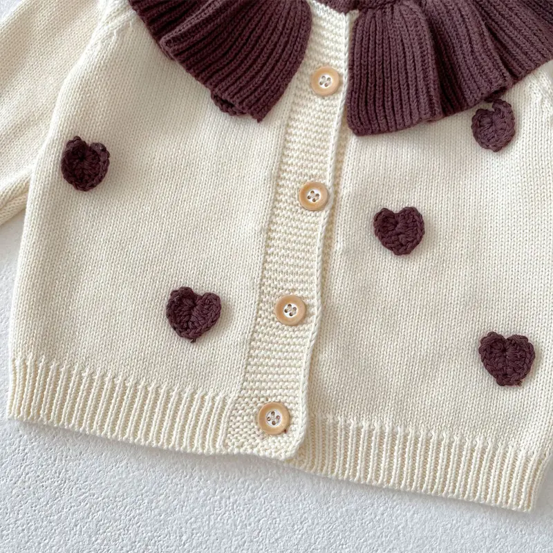 Autumn new baby clothing, 0-3 year old female baby, lotus collar handmade heart knitted long sleeved jacket
