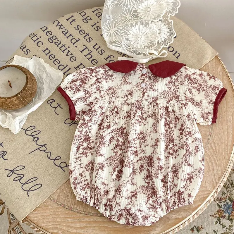 New summer baby clothing, 0-3 year old girls, printed pure cotton doll neck short sleeved jumpsuit climbing suit