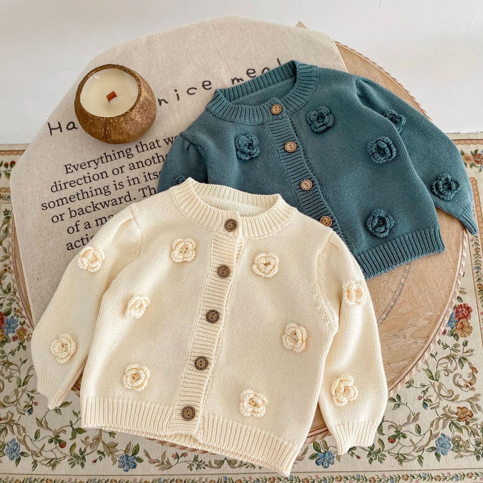 Autumn new 0-3 year old baby clothing, baby girl three-dimensional flower blue round neck long sleeved knitted sweater