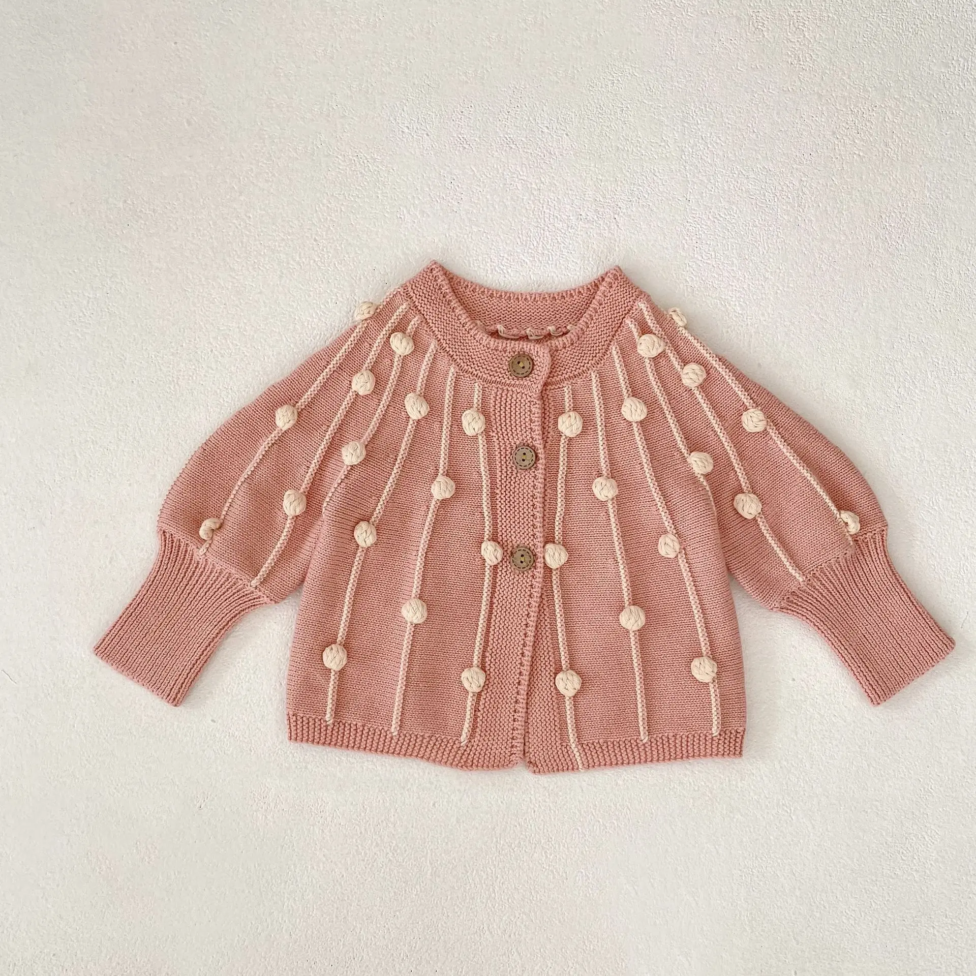 Autumn new 0-3 year old baby clothing, exquisite baby girl pink round neck palace style long sleeved knitted cardigan