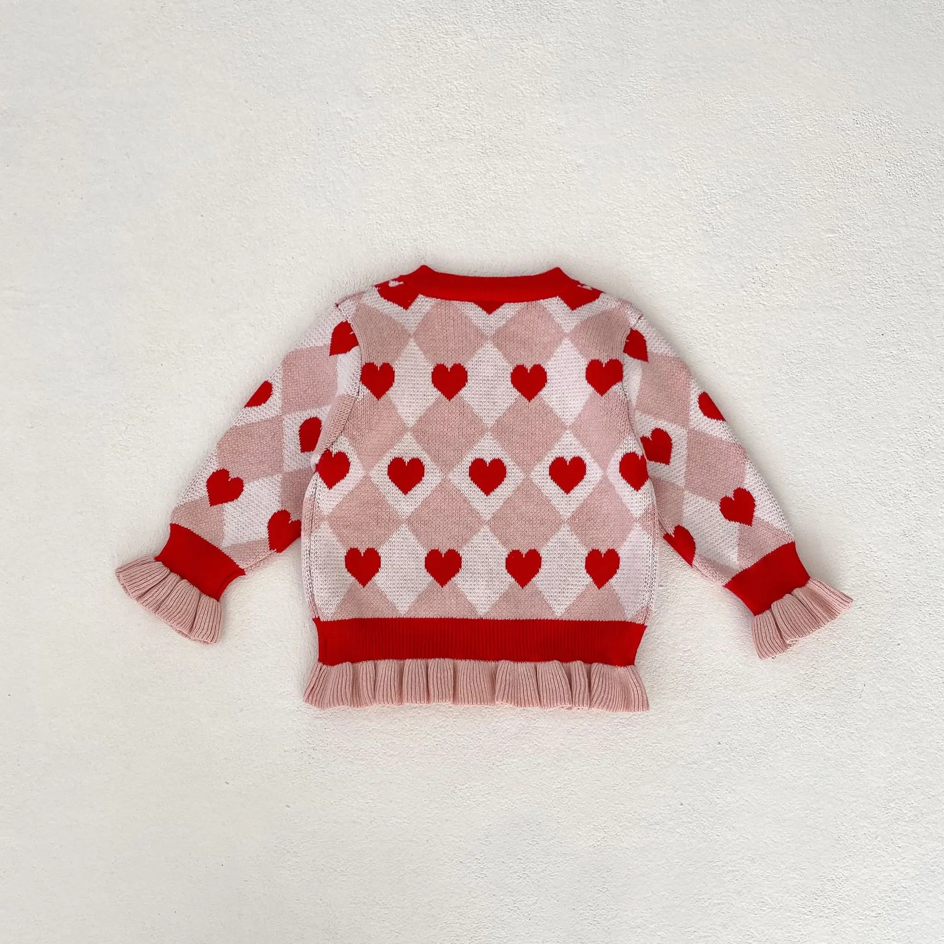Autumn new 0-3 year old baby clothing, exquisite heart-shaped mushroom edge long sleeved knitted cardigan for baby girls