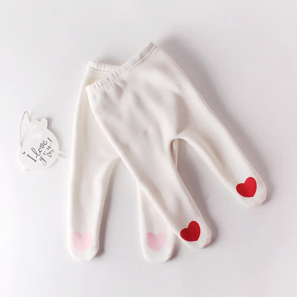 New autumn clothing for infants aged 0-3, cute heart-shaped leggings for baby girls, and soft fitting pantyhose for easy wearing