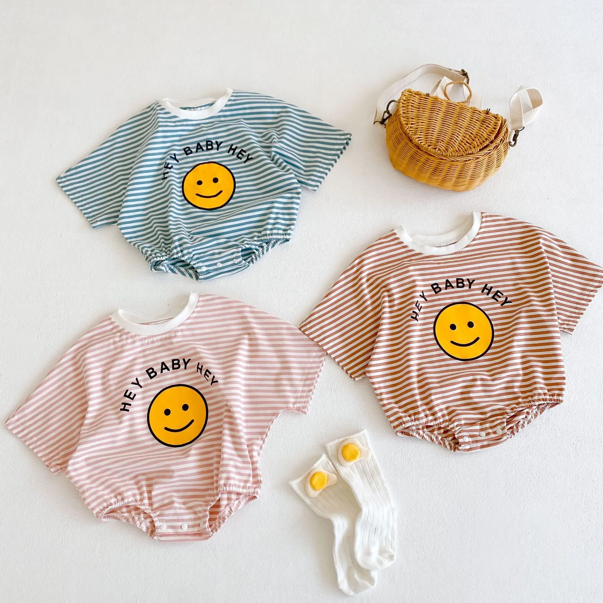 Summer new 0-3 year old baby clothing, fashionable striped short sleeved top, cute smiling face pattern jumpsuit