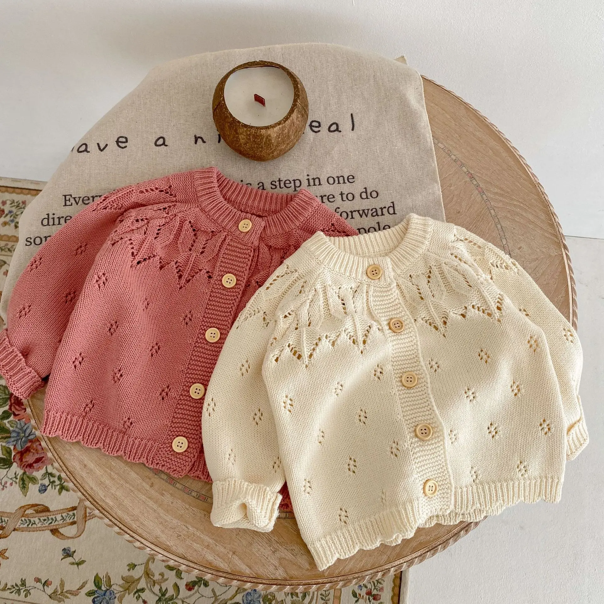 New autumn baby clothing for 0-3 years old, baby girl jacquard hollow knitted long sleeved round neck apricot cardigan